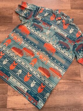 Raised by Coyotes Polo with Orange Buffalo Print